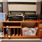 F62. Media cabinet with record storage.